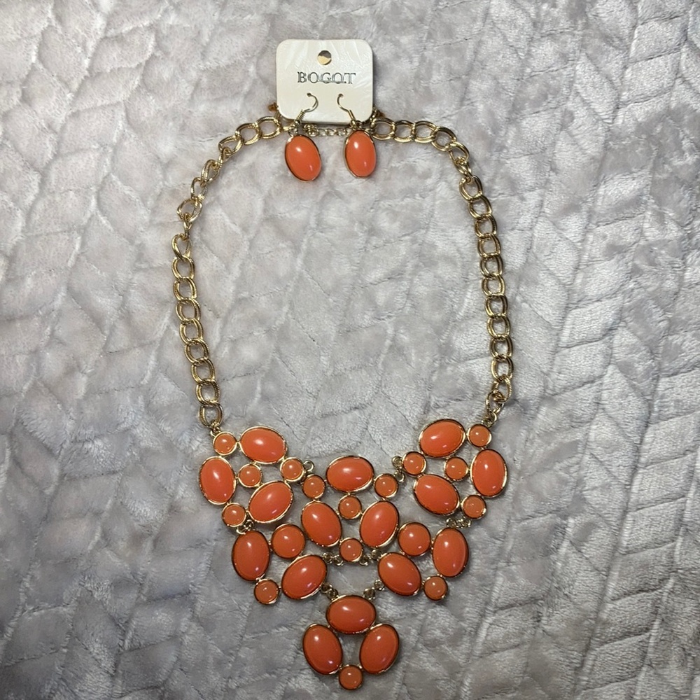 Orange necklace with gold detail